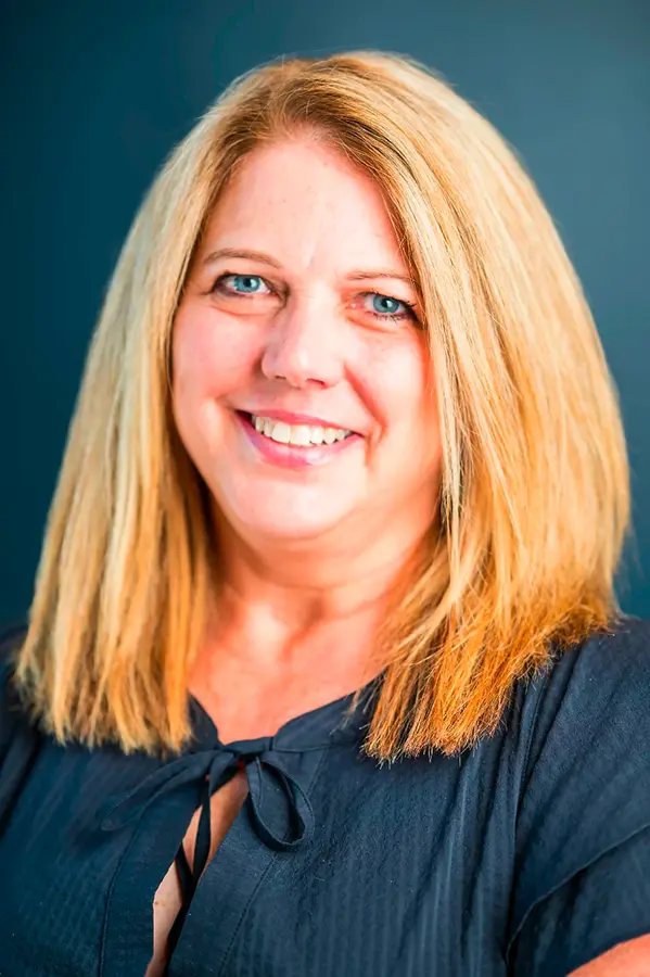 Professional headshot of Nancijo Pruce, RICP