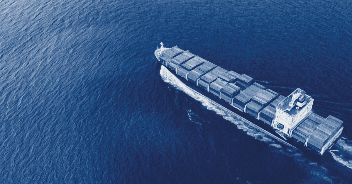 Aerial view of a cargo ship crossing the ocean