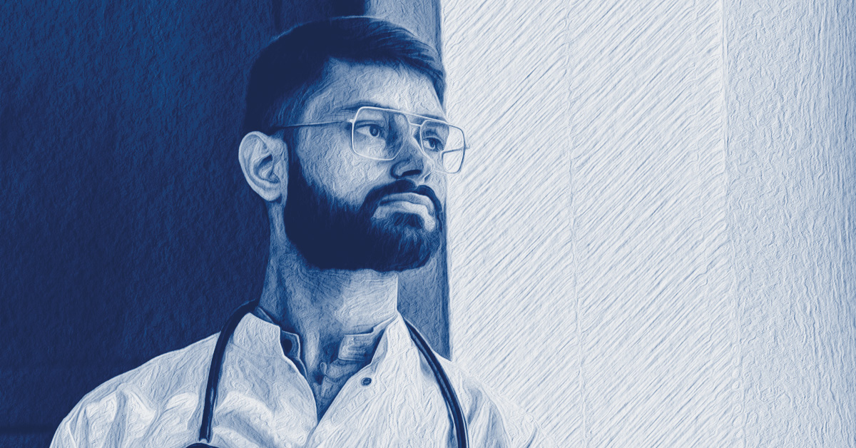 A young doctor looking into the distance