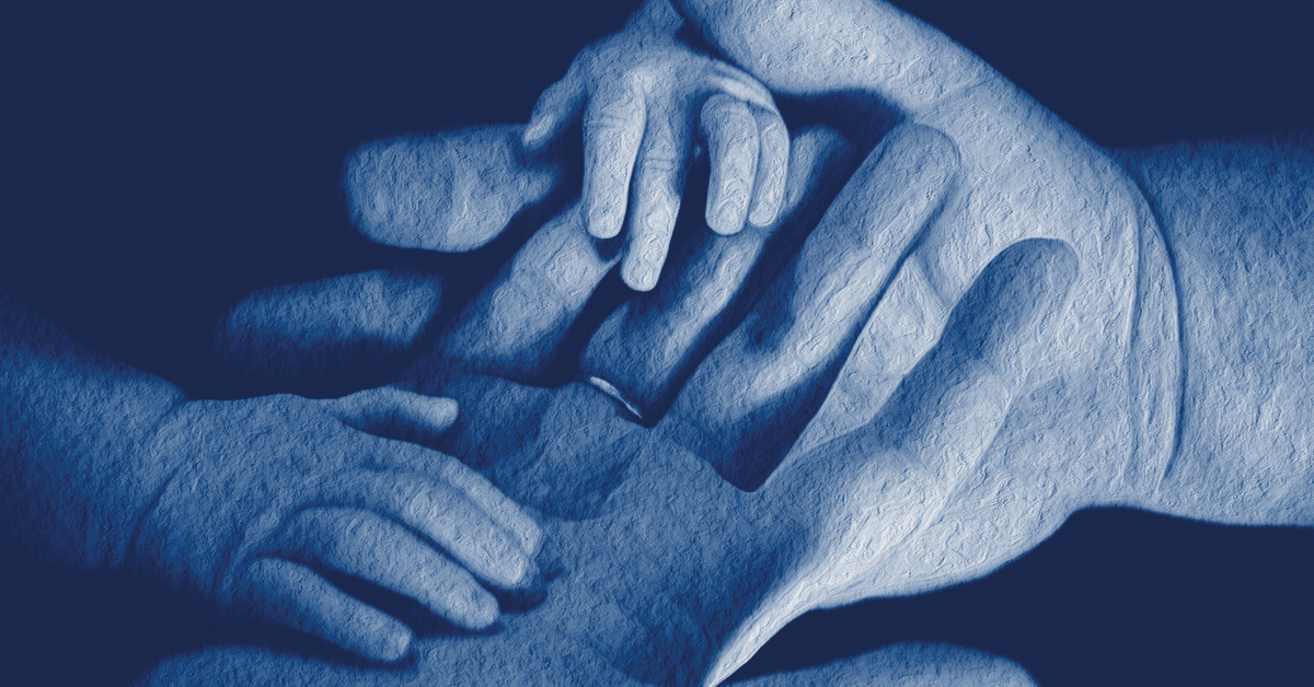Multigenerational concept - close up of mother, father, and baby's hands.